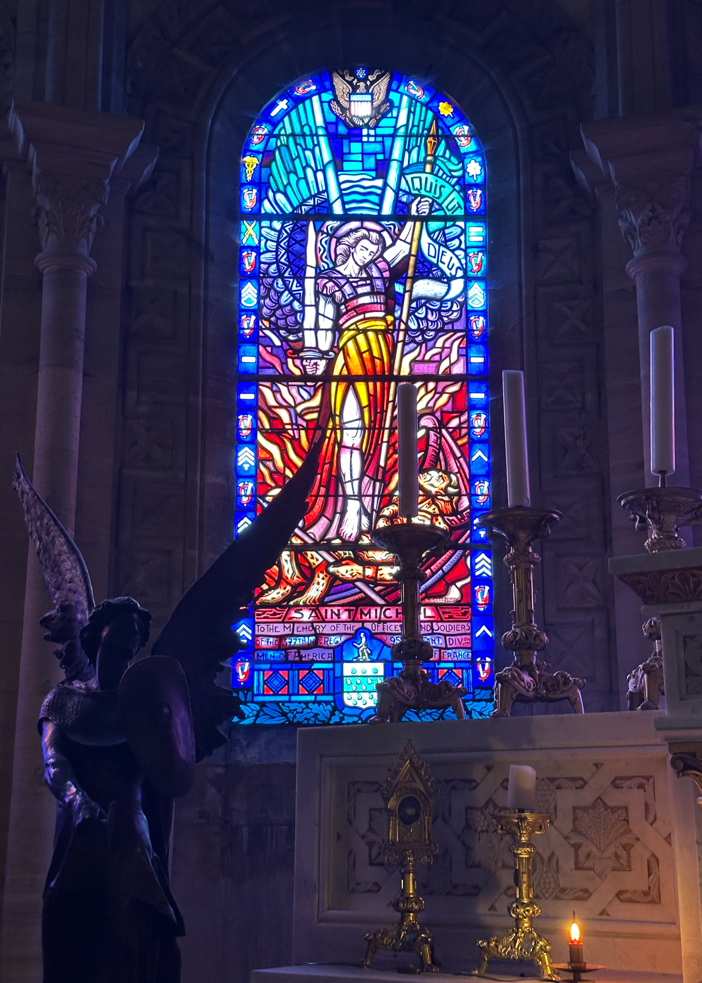 The stained glass window in Saint Aignan Church in Trevieres, France is dedicated to the 95th Infantry Division. The window recognizes the soldiers of the 95th ID who donated money for repairing the church which was damaged during the invasion. A substantial amount of the donations were made by the 377th Regiment. 