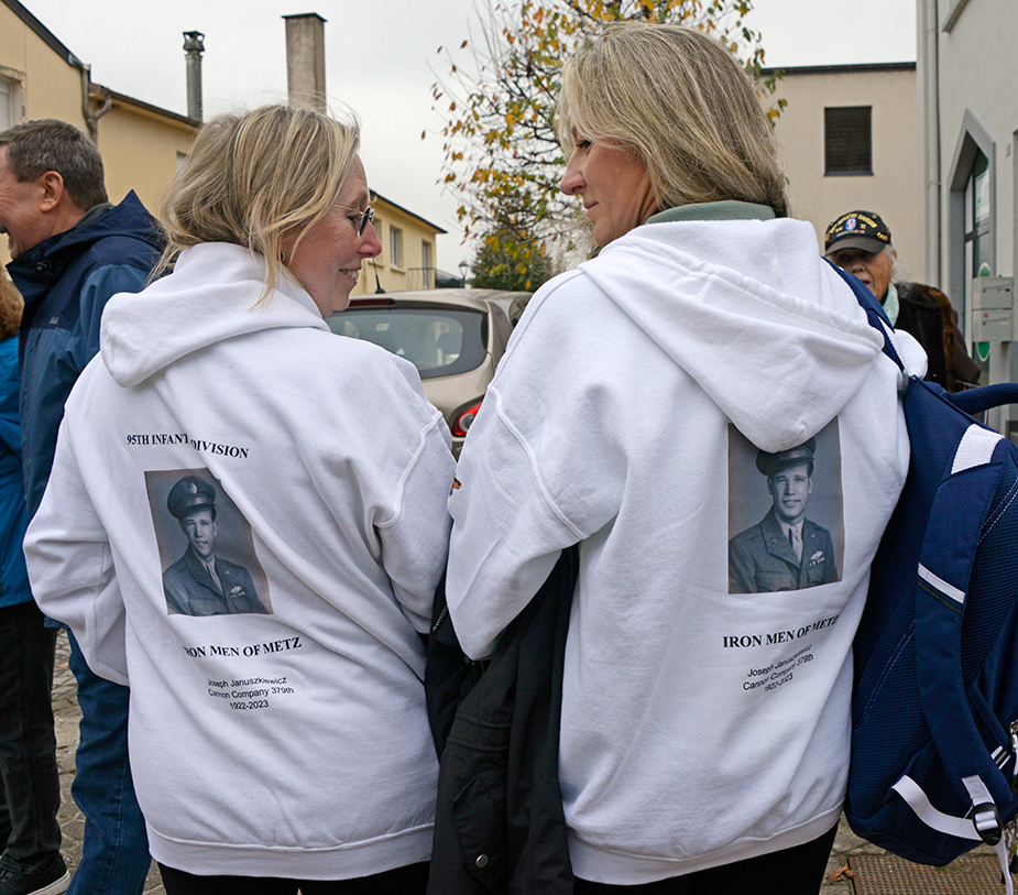 Iron Men descendants were encouraged to bring photos of their World War II veterans to France. Joe Januszkiewicz’s daughter, Kim Kowalczyk, and granddaughter, Tanya Chang, went one step further and proudly wore hoodies with Joe’s Army portrait.