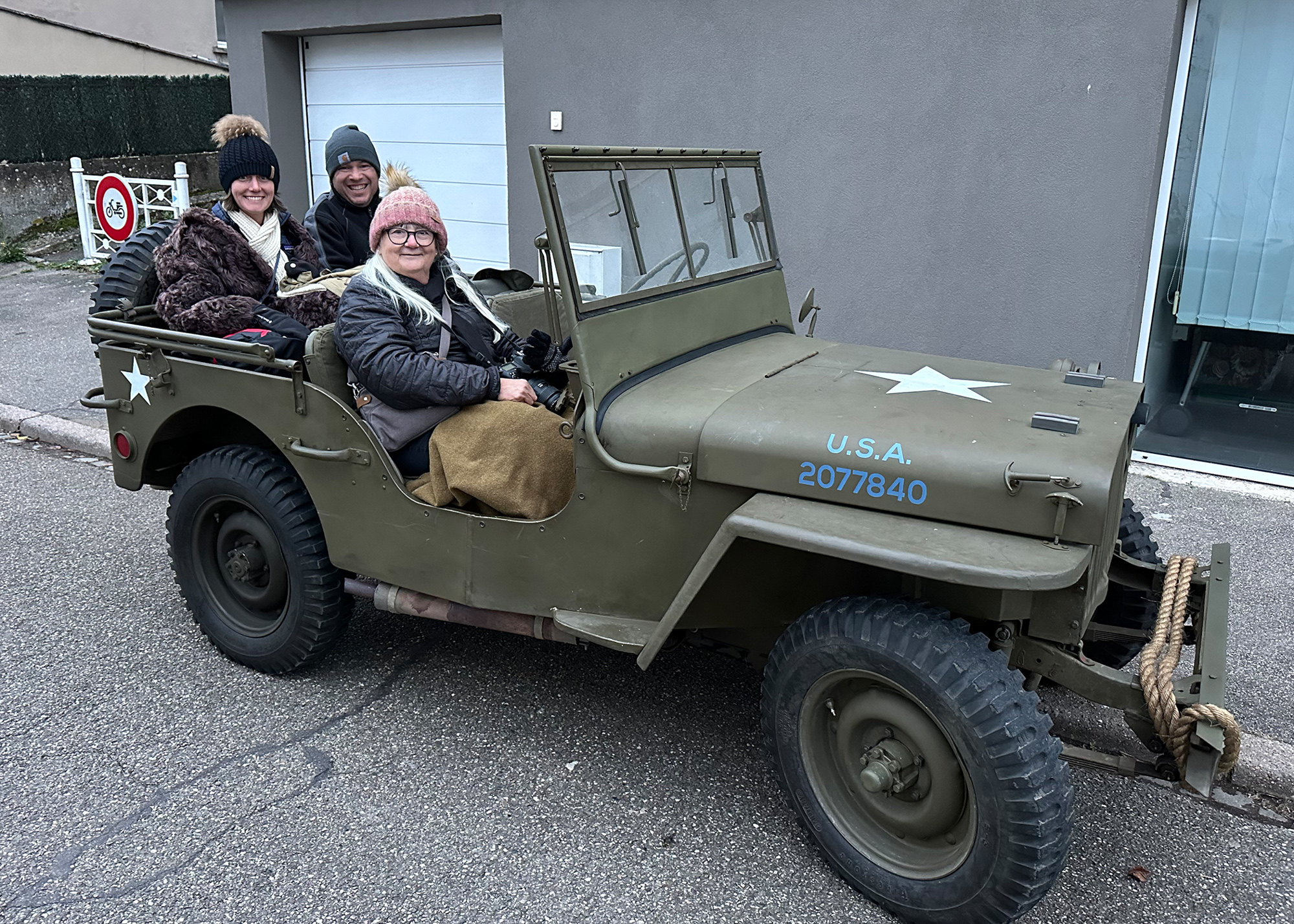 Thomas Grandjean drove Darcy Flora, Dave Neiman and Marsha Flora in Théo Muller’s jeep from Faulquemont to the C.L.V.M.A. motorpool. This was the lead jeep with a convoy of various WWII military vehicles following. Théo’s 1942 Willys was marked 95-378-I on the left front bumper and F1 on the right—the same markings that were on Marsha’s dad’s/Darcy’s grandfather’s jeeps during the war.