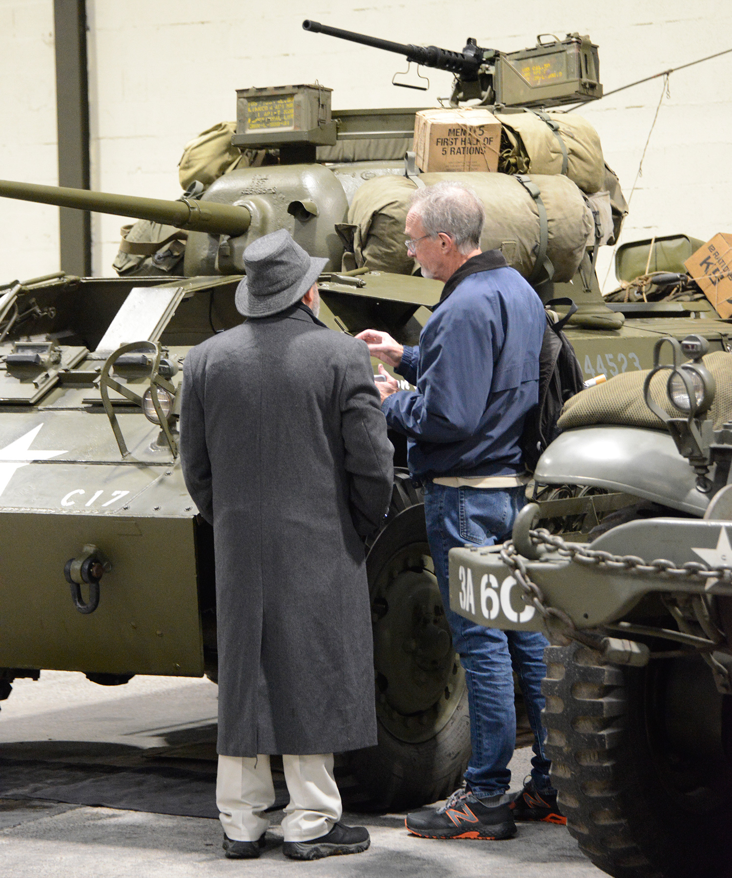 Terry Earnest and John Cannon in front of the Ford M8 Greyhound.