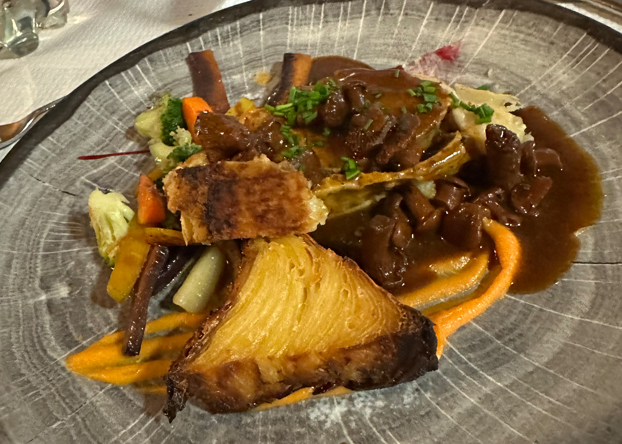 Veal Wellington with vegetables and potatoes