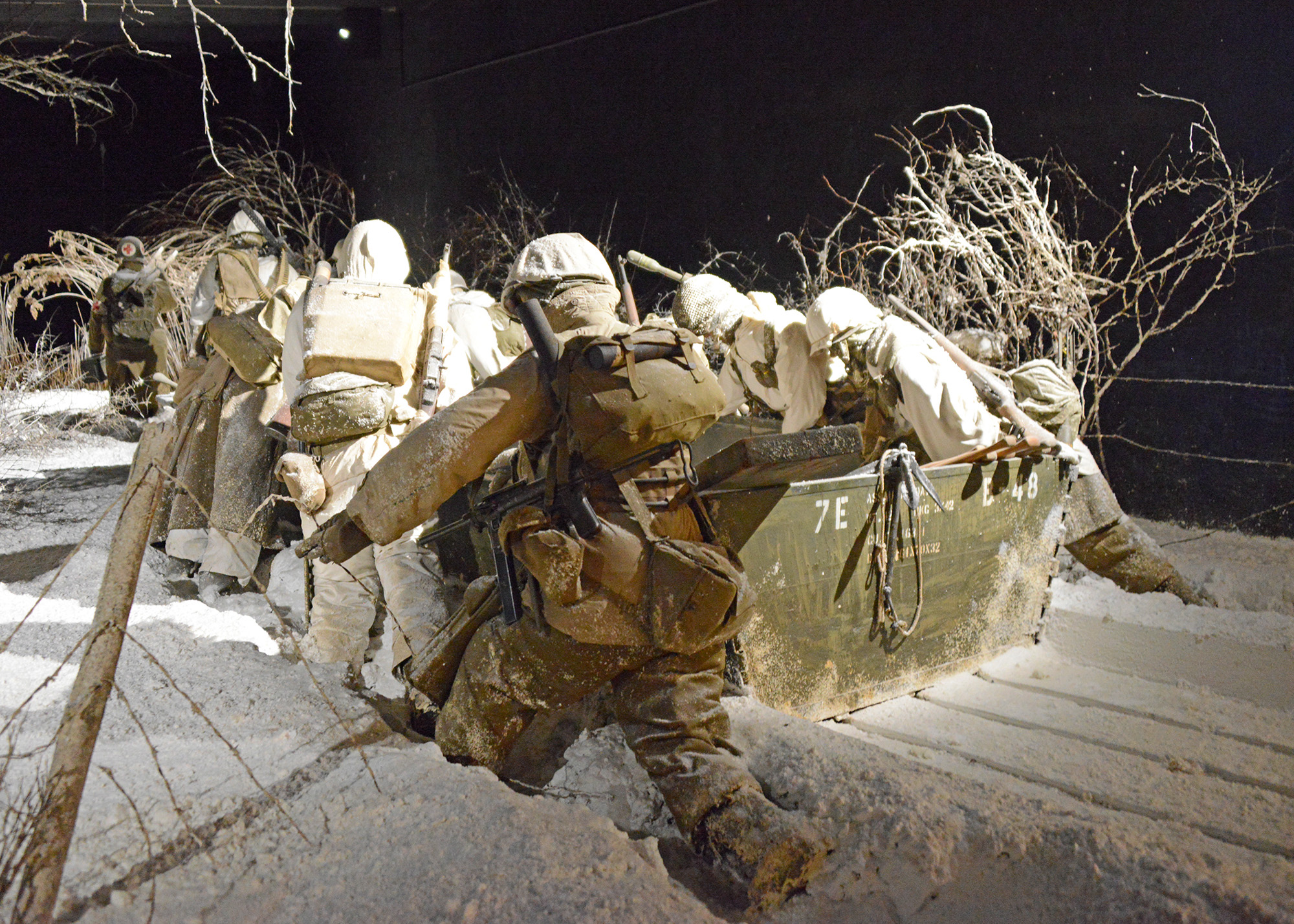 Display of American GIs preparing for a river crossing.