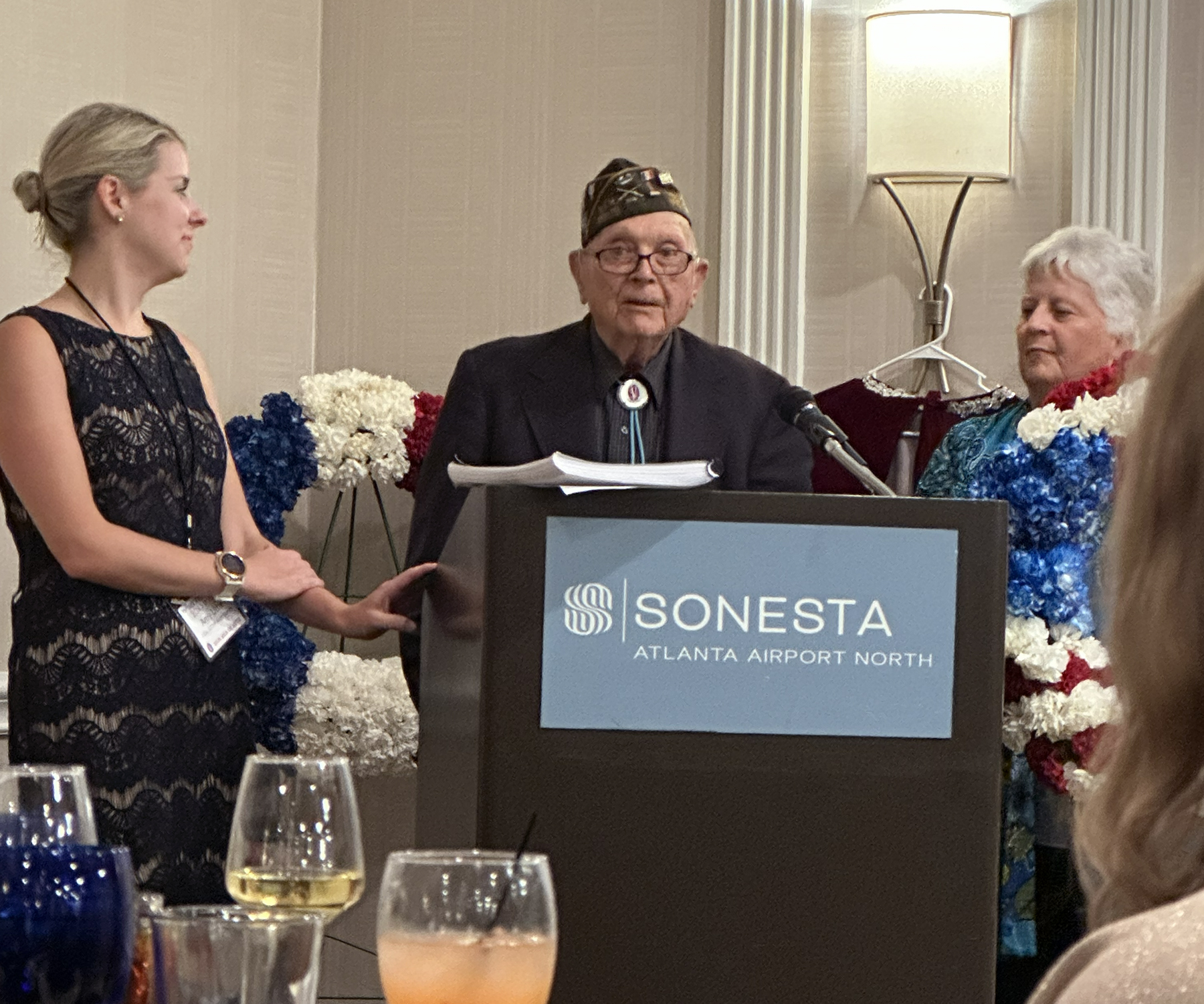 With the assistance of Amy Little and Billie Bauer, Ceo Bauer presents his Achievement Awards before beginning his Mirabelle Toast at the Formal Banquet.