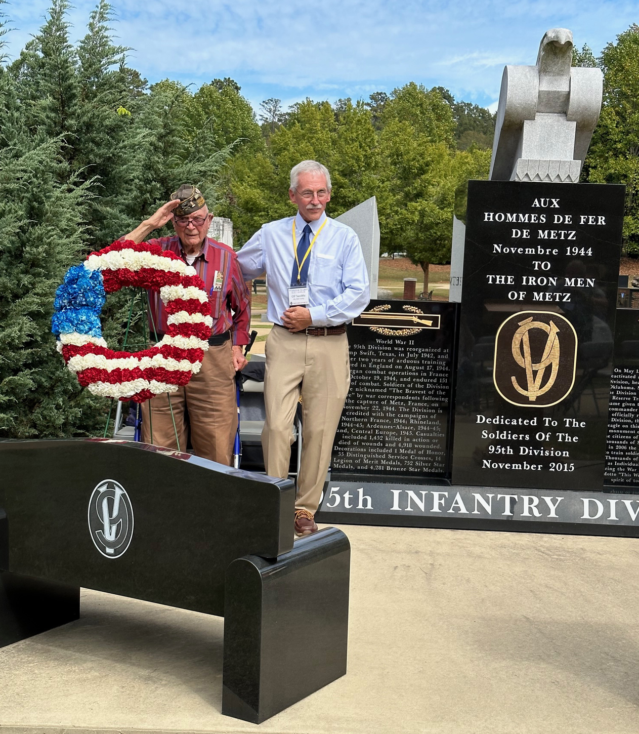 Ceo Bauer and Association President Clif Twaddle stand at the dedication of the benches honoring Maj. Gen Harry L. Twaddle and Staff Sgt. Andrew Miller on the Walk of Honor at Fort Moore, Thurs., Oct. 5, 2023. Ceo was the only 95th Infantry Division WWII Veteran in attendance.