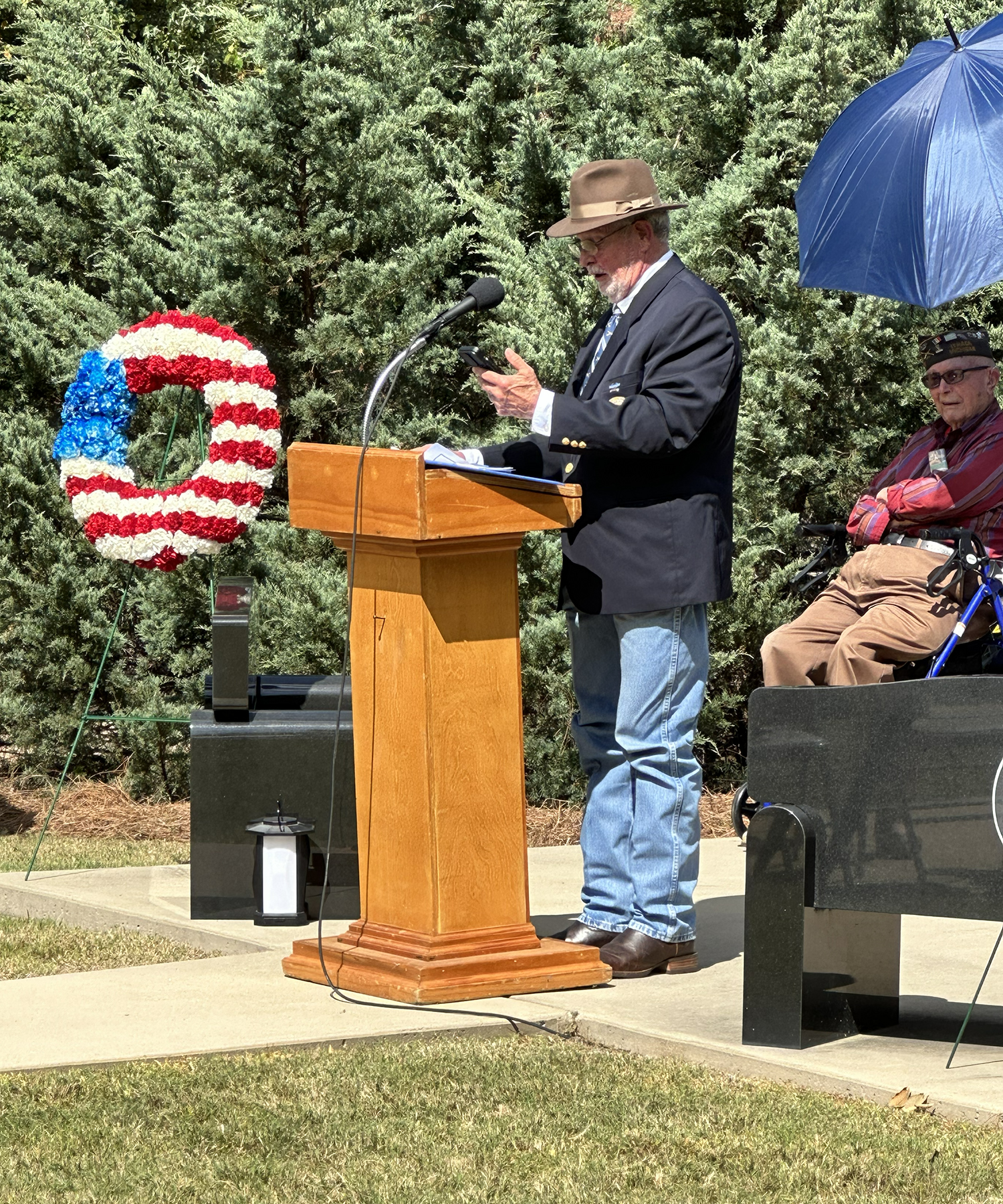 Ted Cox is the guest speaker near the site of the 95th Eagle Monument at Fort Moore.