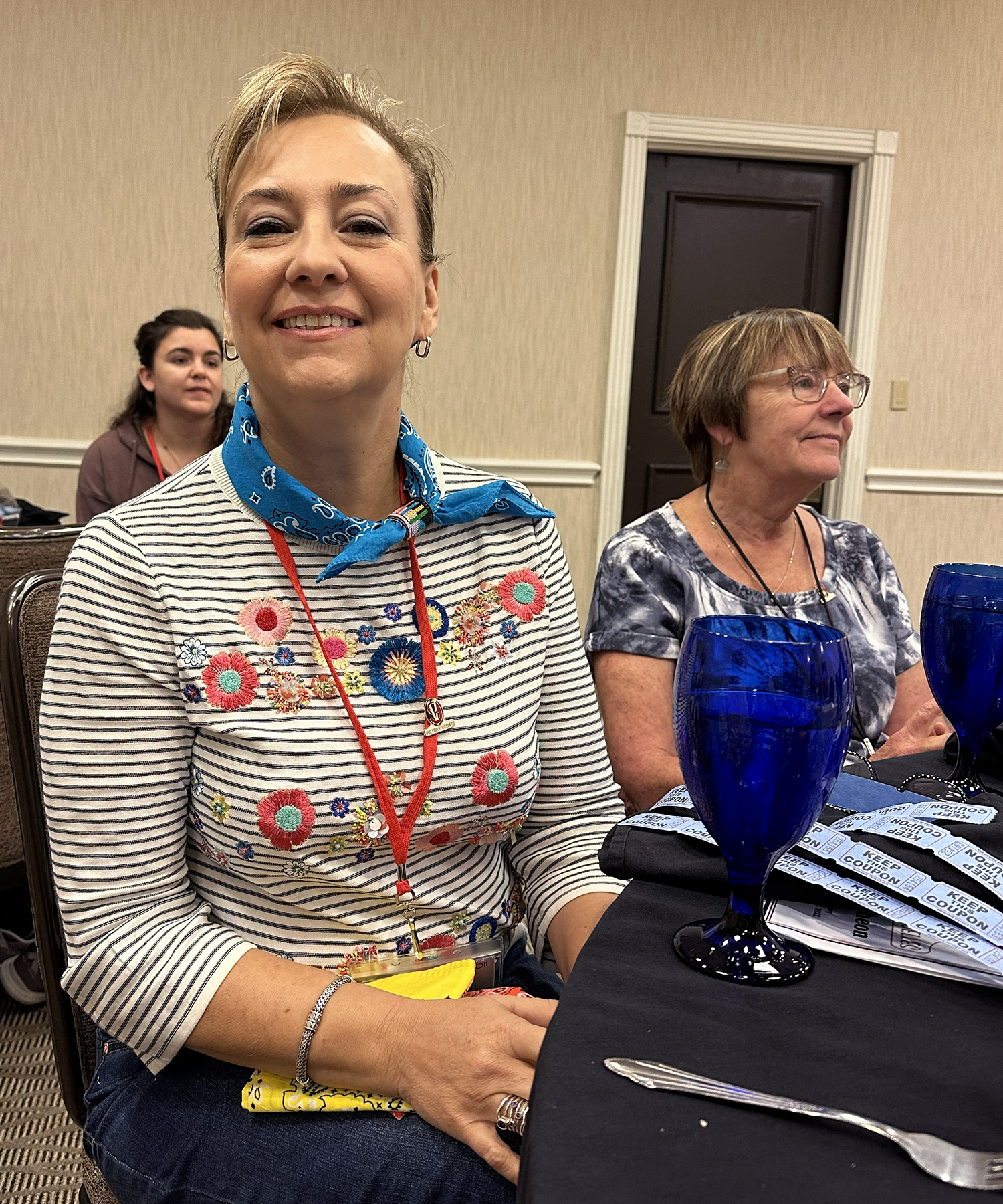 Kelly Curll has her raffle tickets organized in front of her prior to the beginning of the Victory Belle raffle.
