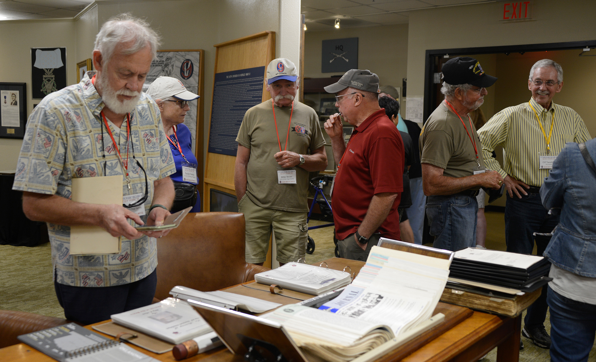David Meyer, Susan Feely, Mike Bever, Dan Foust, Ted Cox, Clif Twaddle and other attendees at the 95th Division Legacy Association 74th annual reunion peruse the Memorial at Fort Sill, Friday May 17, 2024.