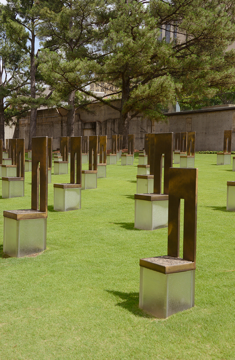 The chairs in the Field of Empty Chairs at the Oklahoma National Memorial are arranged in nine rows to symbolize the nine floors of the building; each person's chair is on the row (or the floor) on which the person worked or was located when the bomb went off.