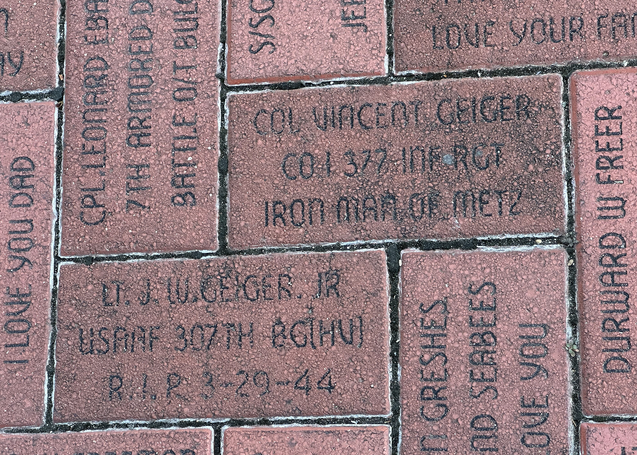 The sidewalks throughout the National WWII Museum and campus are paved with commemorative bricks such as this one for Col. Vincent Geiger, Co. I, 377th Reg, 95th ID.