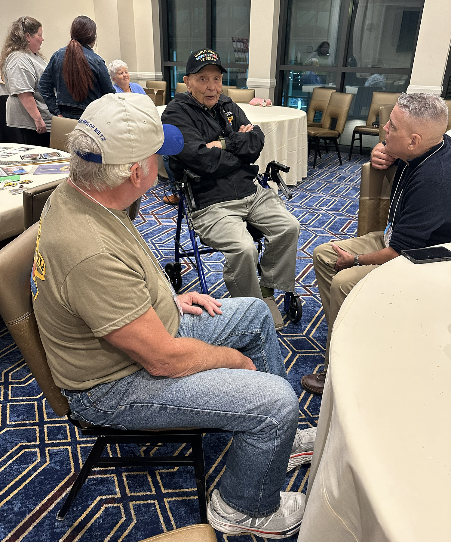 Mike Bever, Ceo Bauer and Dan McCarthy in the Hospitality Room.