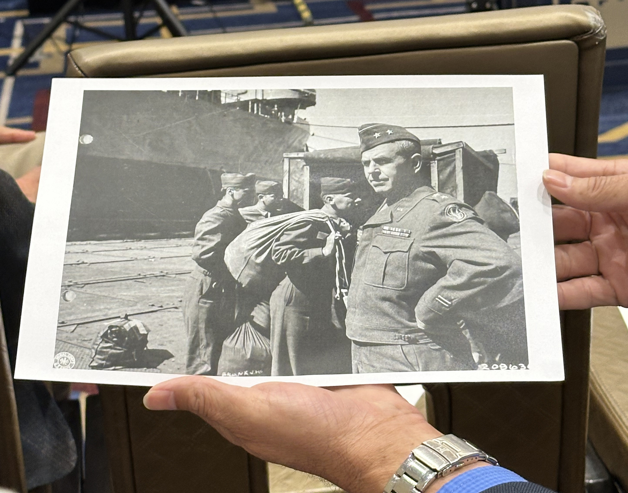 Théo Muller presented Clif Twaddle with a copy of a photo of Clif's grandfather, MG Harry Twaddle, found at the National Archives.