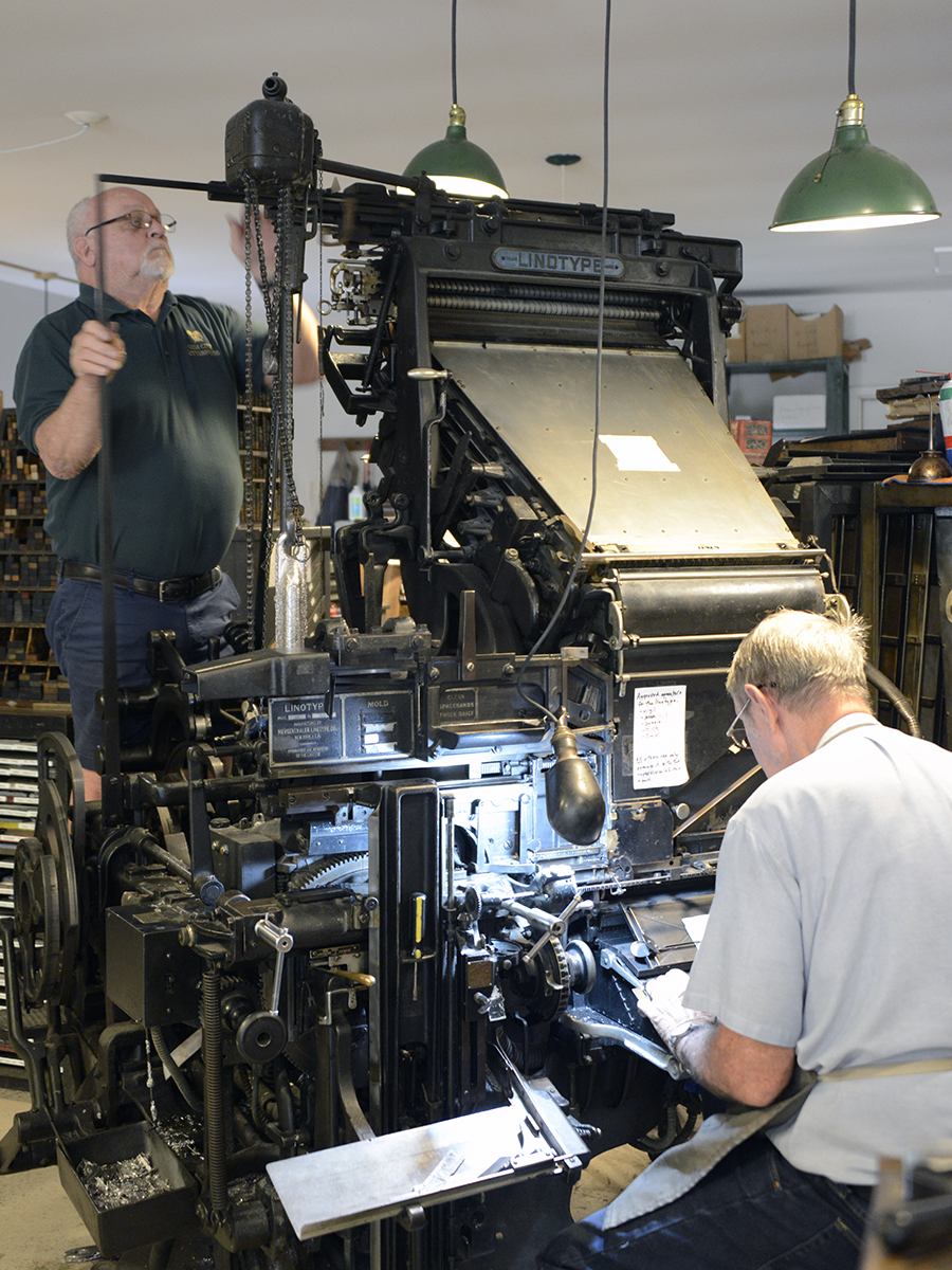 A volunteer adjusts the antique linotype machine at the Gem City Letterpress Co. at Carillon Historical Park, Friday, Aug. 21, 2026.