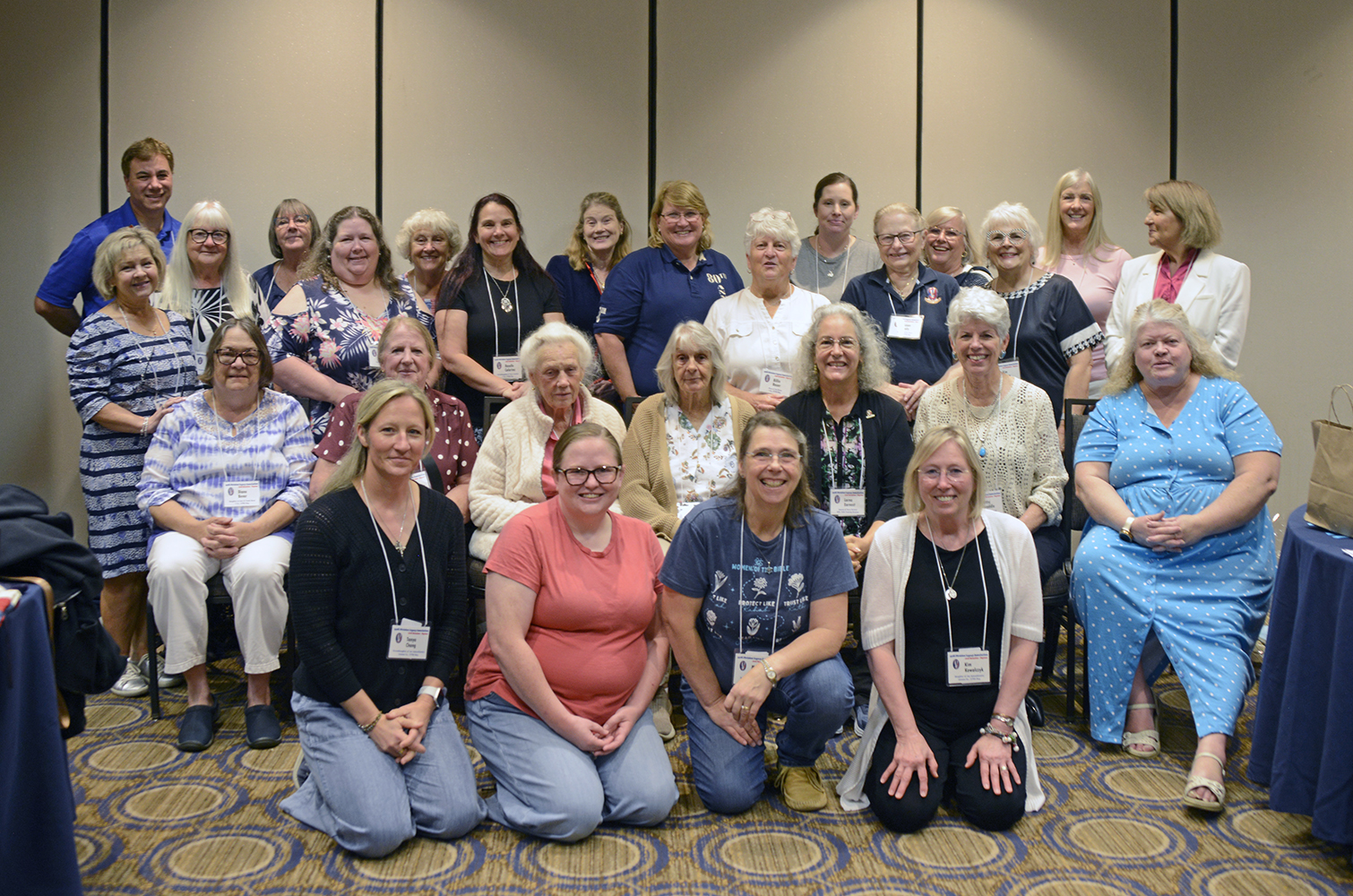 Following the Saturday luncheon and raffle, Victory Belle attendees gathered for a group photo.